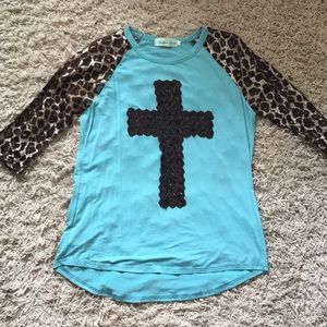 Cheetah sleeve shirt with cross